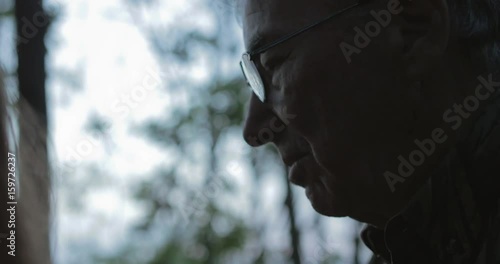 Older man talking and teaching girl