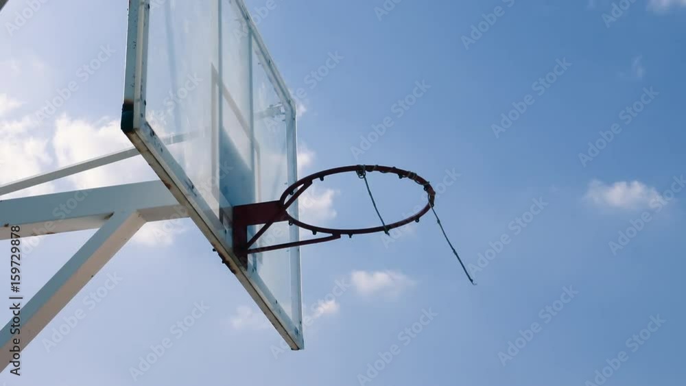 Outdoor Basketball cage stand beautiful clouds moving Outdoor Basketball cage stand beautiful clouds moving