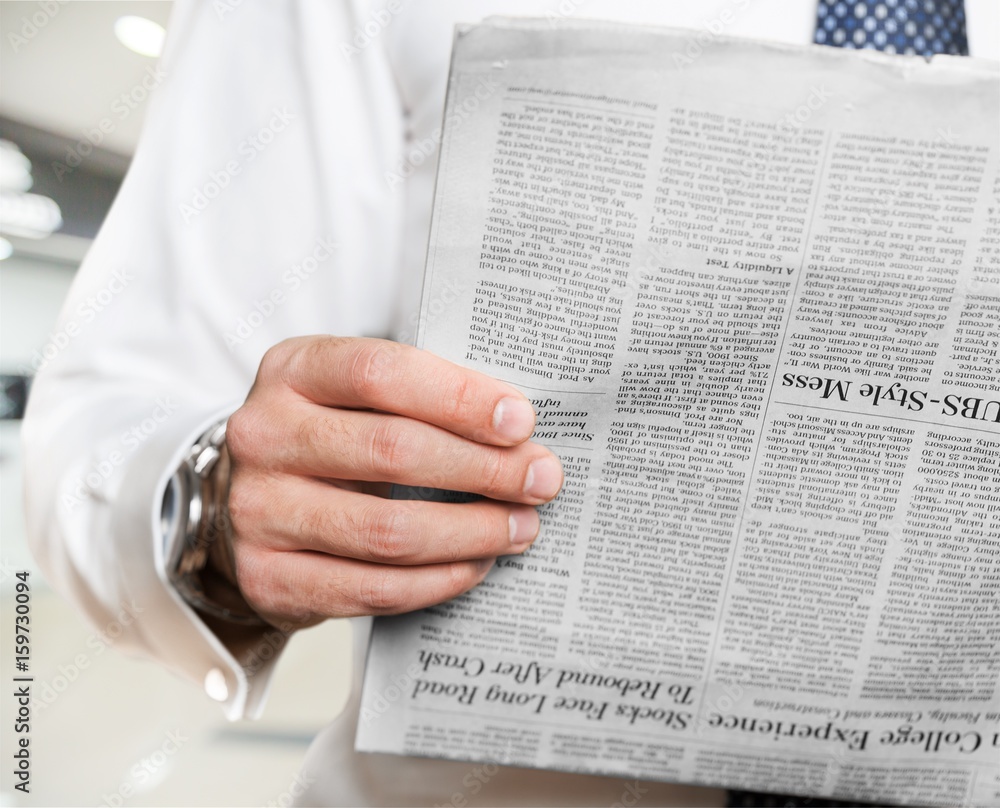 Naklejka premium Man read newspaper.