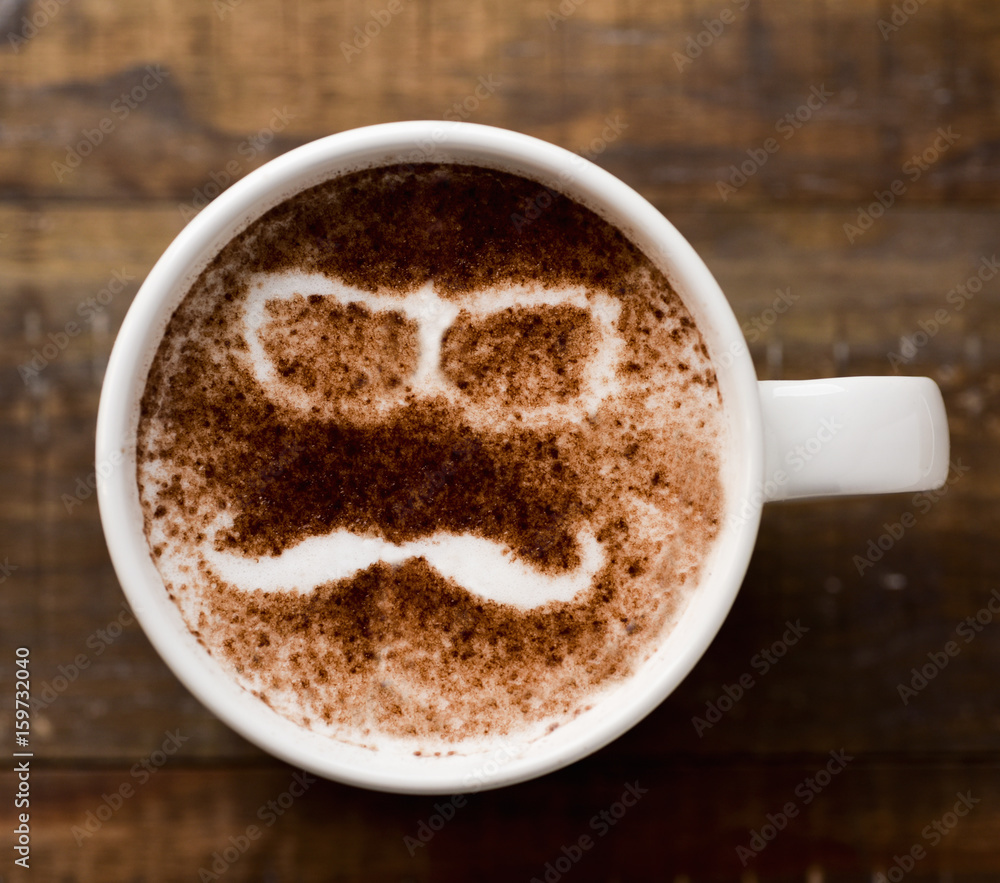 man face in a cup of cappuccino man face in a cup of cappuccino