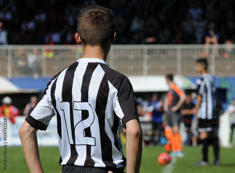 Fototapeta premium pupille avant le coup d'envoi du match de football