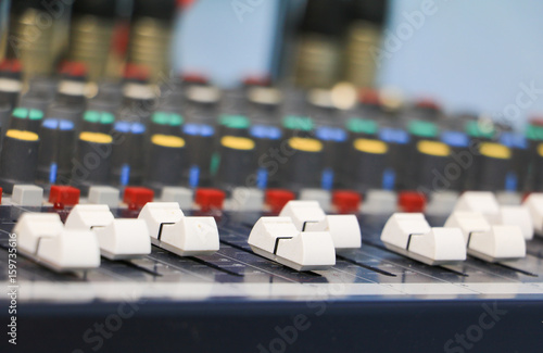 sound mixer control with covered in dust dirty. select focus with shallow depth of field