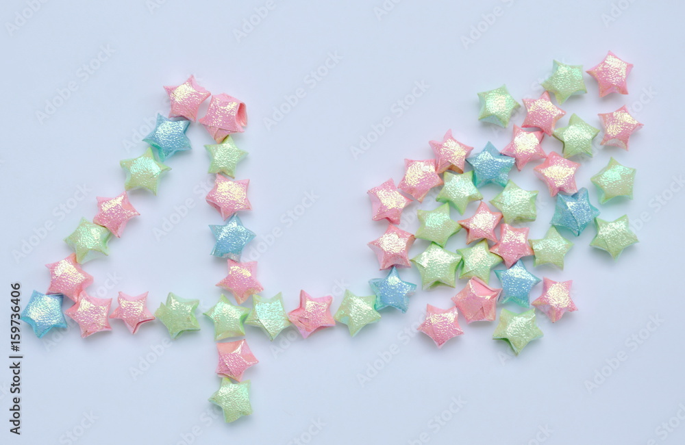 star paper arranging number four concepts fourth of July on white background