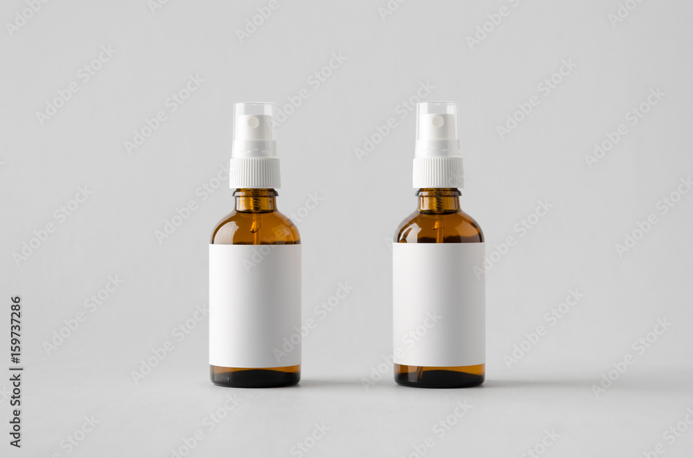 Amber Spray Bottle Mock-Up - Two Bottles. Blank Label Amber Spray Bottle Mock-Up - Two Bottles. Blank Label
