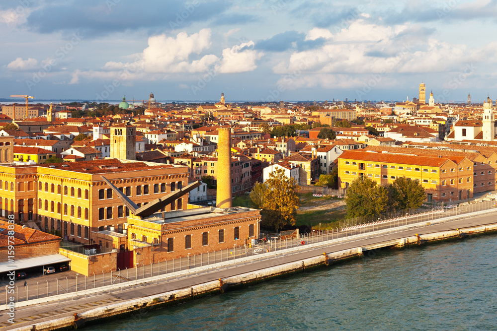 Venice. Top view of the Dorsoduro district and building of the University of Architecture and Fine Arts (Universita IUAV) on the Giudecca Canal in the rays of the setting sun