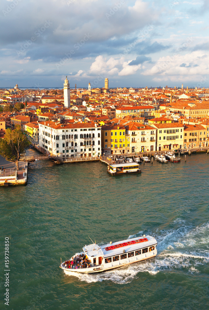 Obraz premium Venice. Top view of the Dorsoduro district and San Basilio water bus stop from above in the rays of the setting sun