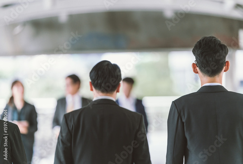 Slika na platnu back view business people walking