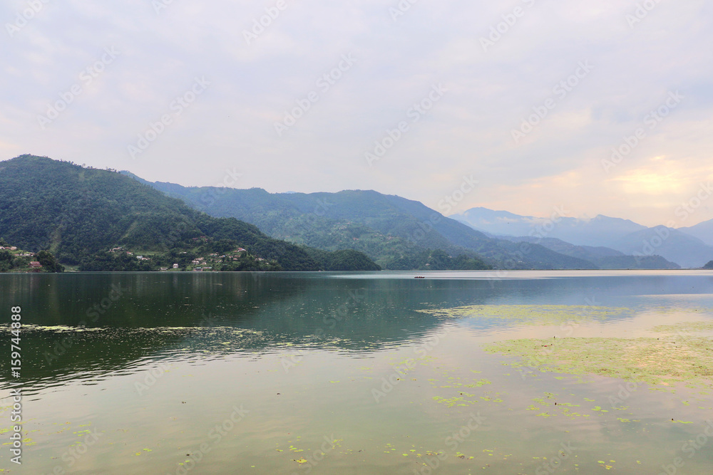 Phewa Lake in Pokhara, second largest freshwater lake in Nepal, famous for the reflection of Machhapuchhre & other mountain peaks on its surface.