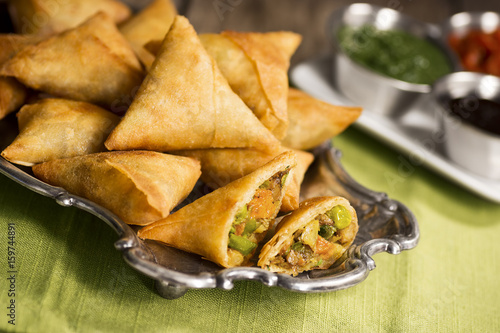 Tableau sur toile Vegetarian Samosas with Dipping Sauces and Chutneys