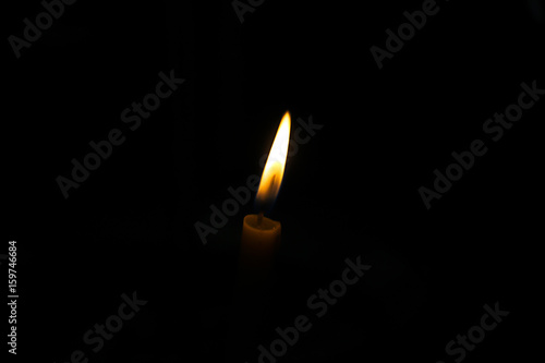 Candle light on black background