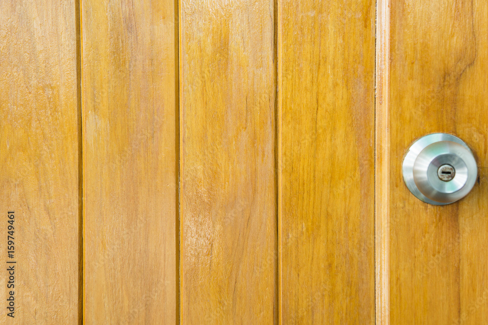 Fototapeta premium door knob wood backgrond , basic wood door