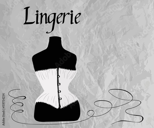 Women's white corset on dress form dummy - vintage underwear - with Lingerie lettering on textured background. Copy space.