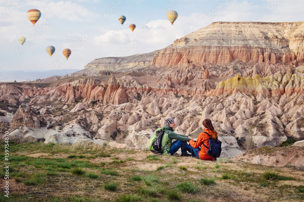 Fototapeta premium People travel in Cappadocia mountains, Turkey