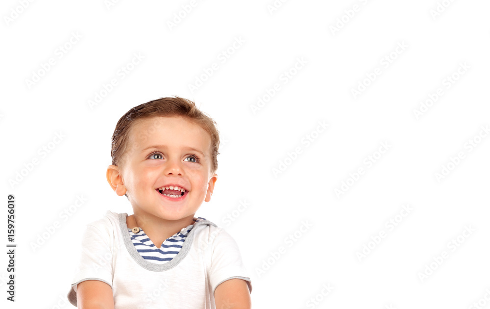 Beautiful little child with a beautiful smile looking up Beautiful little child with a beautiful smile looking up