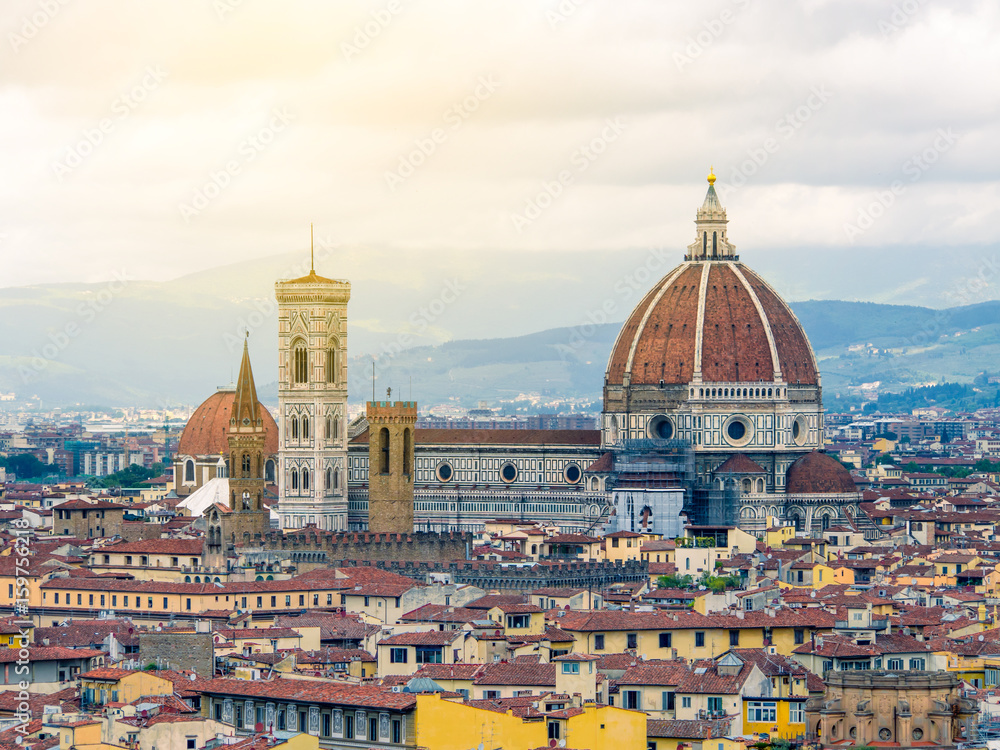Fototapeta premium Duomo Santa Maria Del Fiore and Bargello in the morning from Piazzale Michelangelo in Florence, Tuscany, Italy. Cathedral Santa Maria del Fiore.
