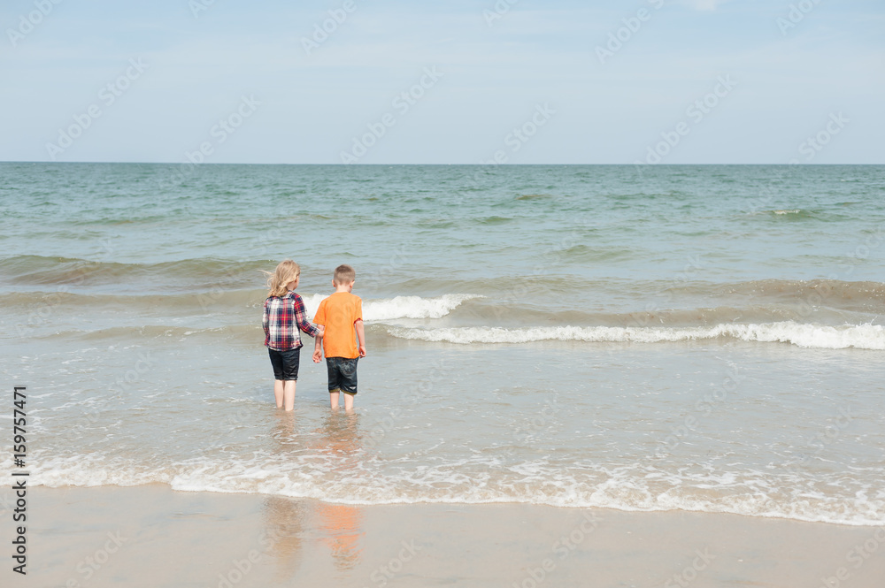 Boy and Girl at the Beach