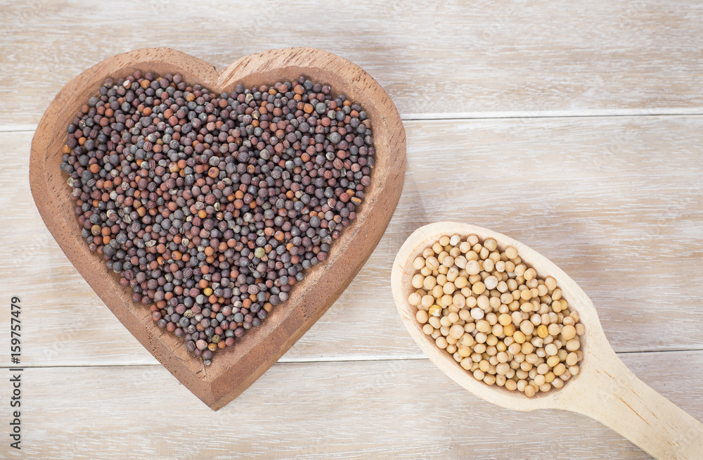 Seeds of yellow and black mustard Seeds of yellow and black mustard