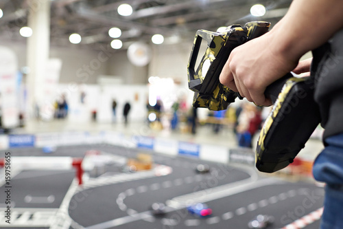 Hand with radio control and competition for model cars