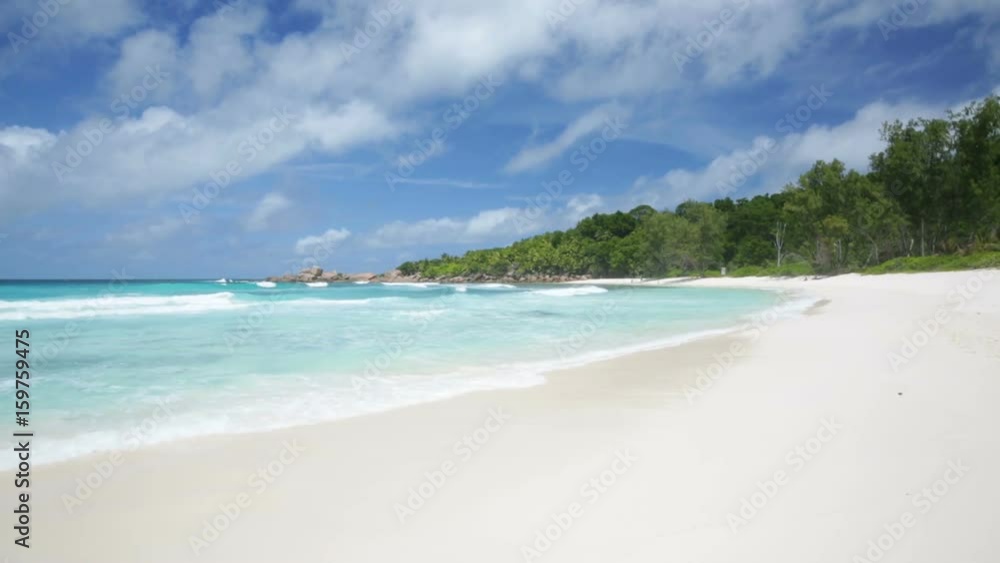 Perfect white beach with turquoise water and granite boulders in the Seychelles. Anse Cocos, La Digue.
Perfect white beach with turquoise water and granite boulders in the Seychelles. Anse Cocos, La Digue.