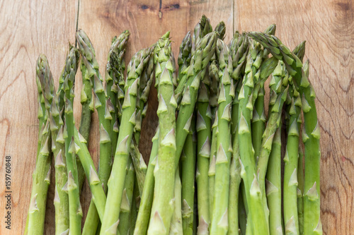 Fresh asparagus on wooden table
