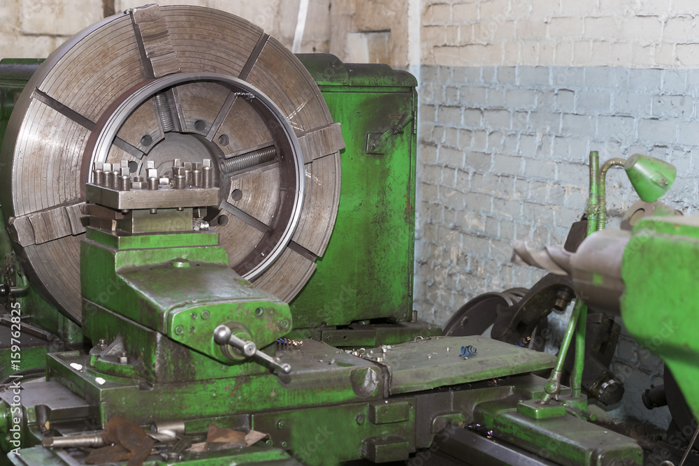 Metalworking machines working mechanisms are shot close-up Metalworking machines working mechanisms are shot close-up