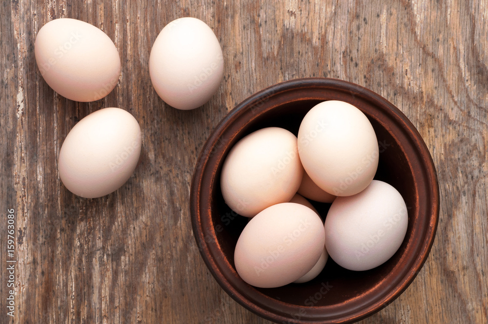 fresh uncooked brown hen eggs. Top view fresh uncooked brown hen eggs. Top view