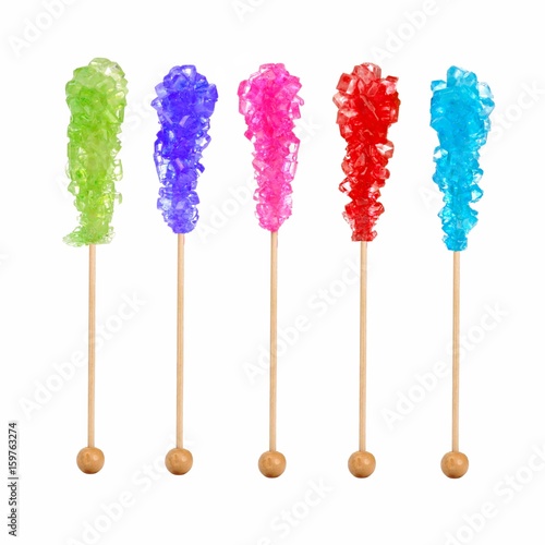 Rock candy in a variety of colors isolated on a white background