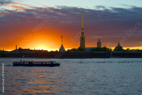 Bild auf Leinwand The boat trip on the sunset at the walls of the Peter and Paul fortress