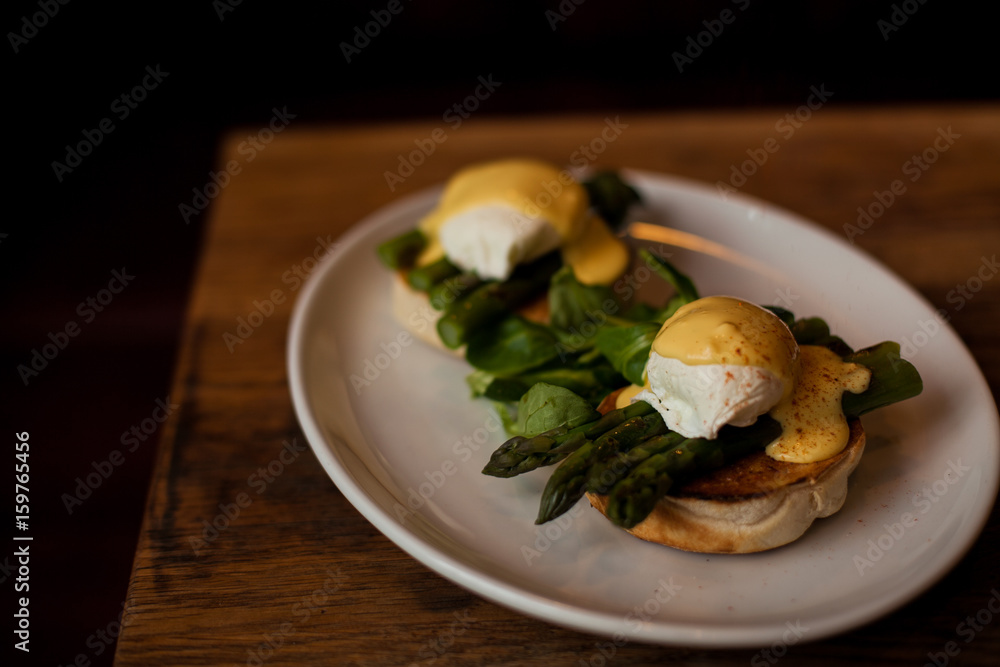 Poached Eggs with Bechamel Sauce  and Asparagus on Toasted Bread