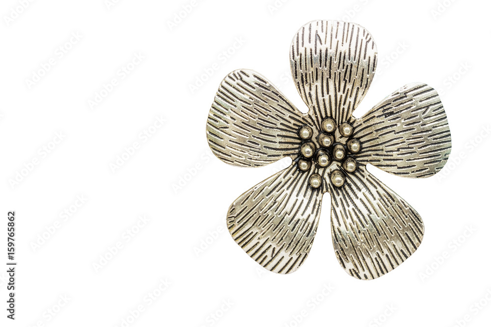 Flowers made of metal or silverware used as ornaments, isolated on white background with clipping path.