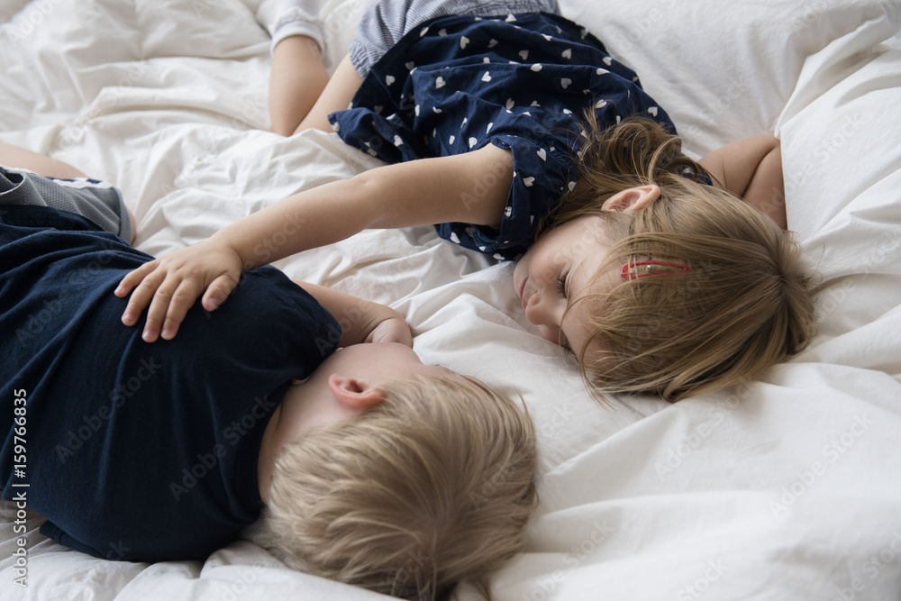 Sleeping Girl Xxxxx Hd Video - Brother and sister sleeping on bed Stock Photo | Adobe Stock