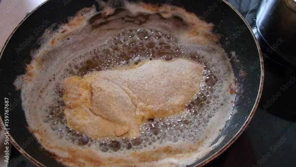 pan-fried steak, fried steak being cooked in a frying pan, pan-fried steak, fried steak being cooked in a frying pan,
