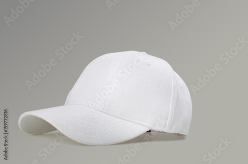 white baseball cap on gray background