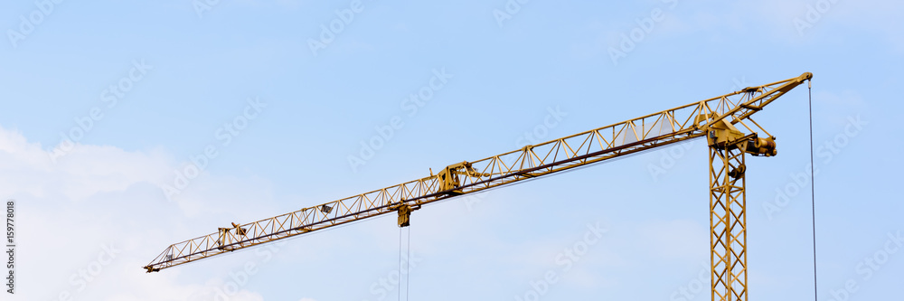 Baukran vor blauem Himmel - Banner Baukran vor blauem Himmel - Banner
