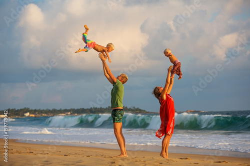A family is having fun at the seashore