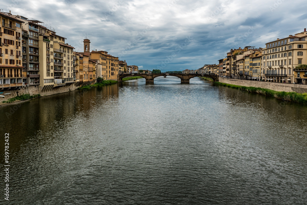 Florence or Firenze city view on Arno river, Tuscany, Italy. Shot from Ponte Vecchio