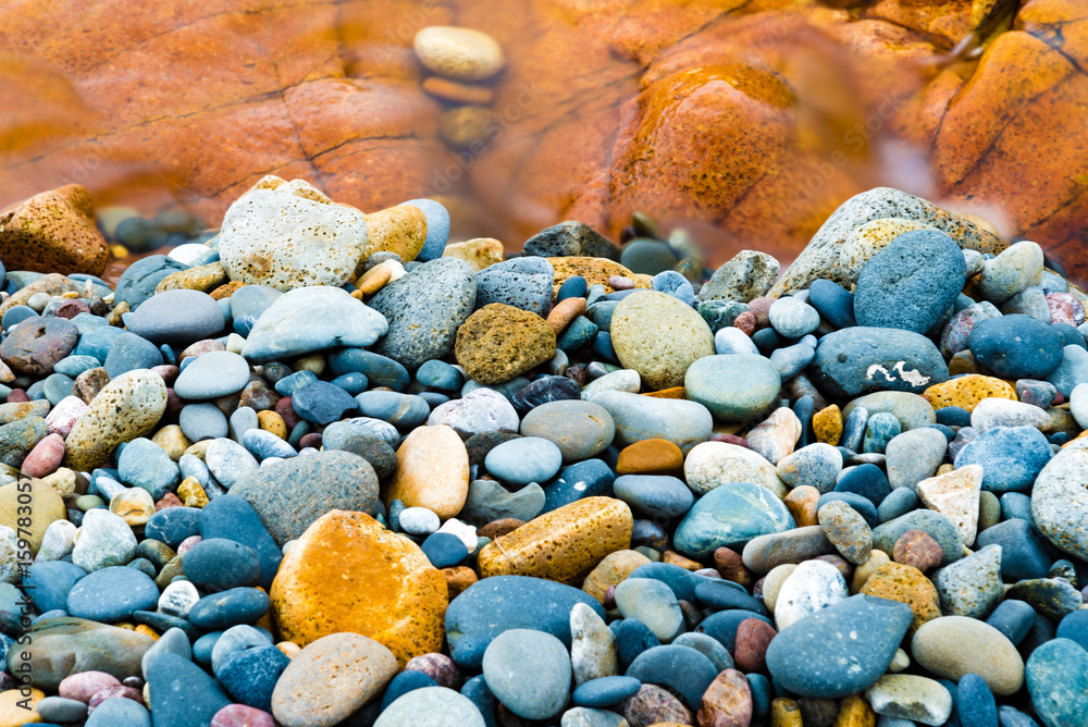 Colourful rocks and water at Diamond Head coast, Australia Colourful rocks and water at Diamond Head coast, Australia