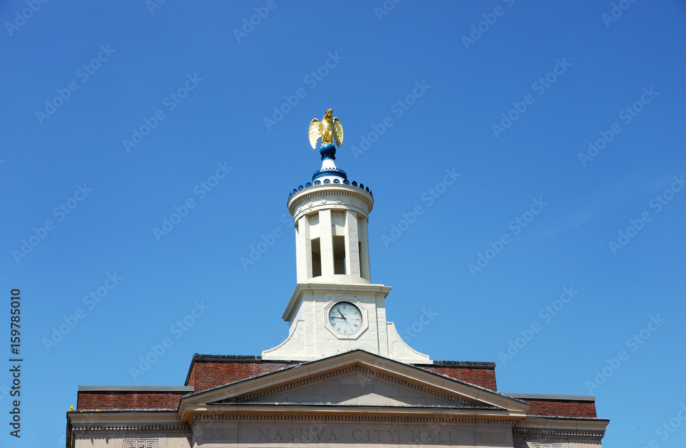 closeup on golden eagle statue on city hall tower of Nashua NH