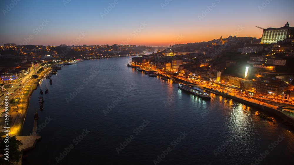 Bird's-eye view of Douro river at dusk, Porto, Portugal.
