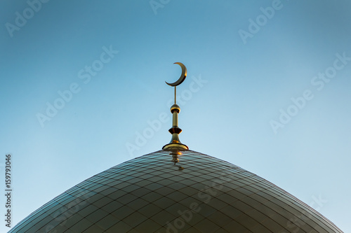 Fotobehang Golden minaret of the mosque
