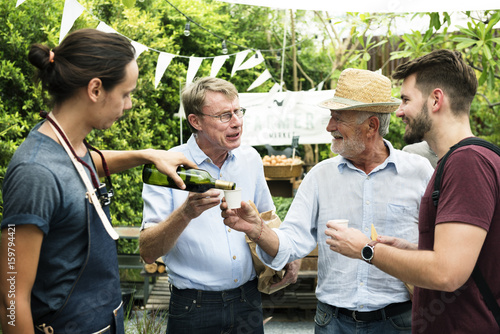 Photography Group of men drinking local red wine together