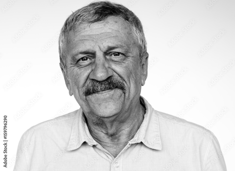 Obraz premium Senior adult man smiling casual studio portrait