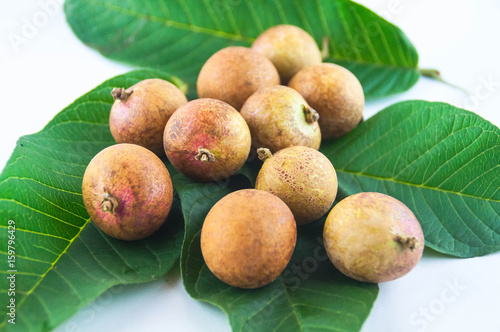  fruit or literally translated as Cat Eye Fruit , a subspecies of the Longan Fruit over white background.