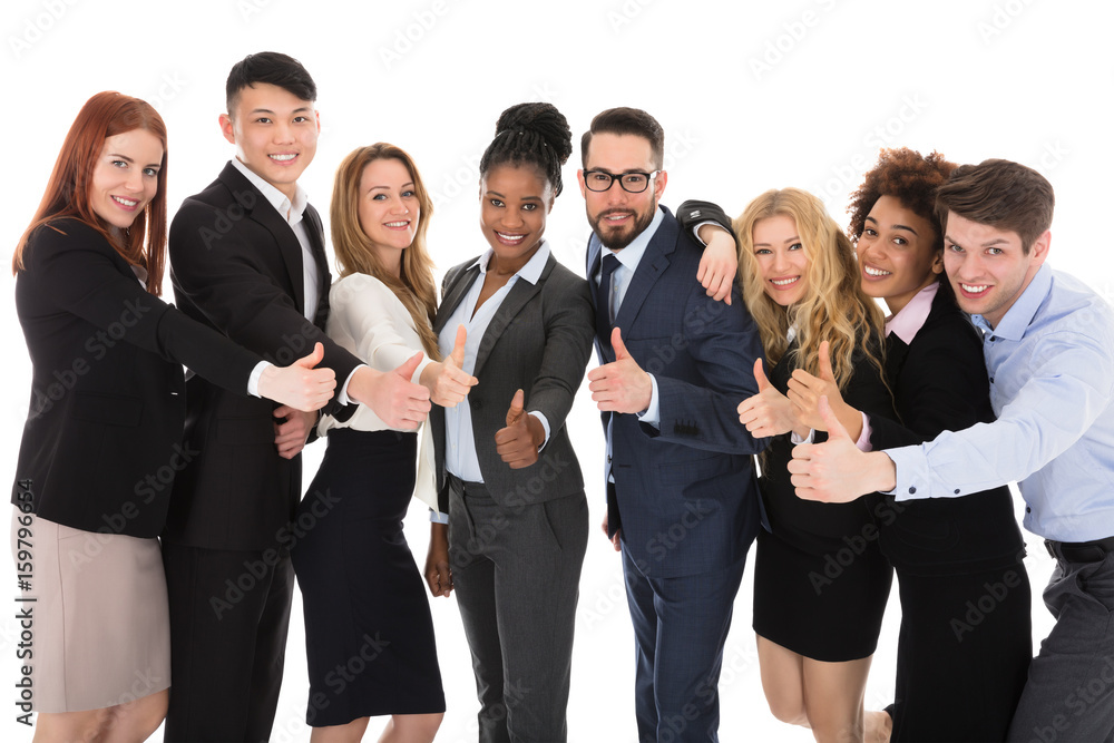 Group Of Multiracial Businesspeople Gesturing Thumbs Up Group Of Multiracial Businesspeople Gesturing Thumbs Up