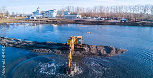 Excavator on water