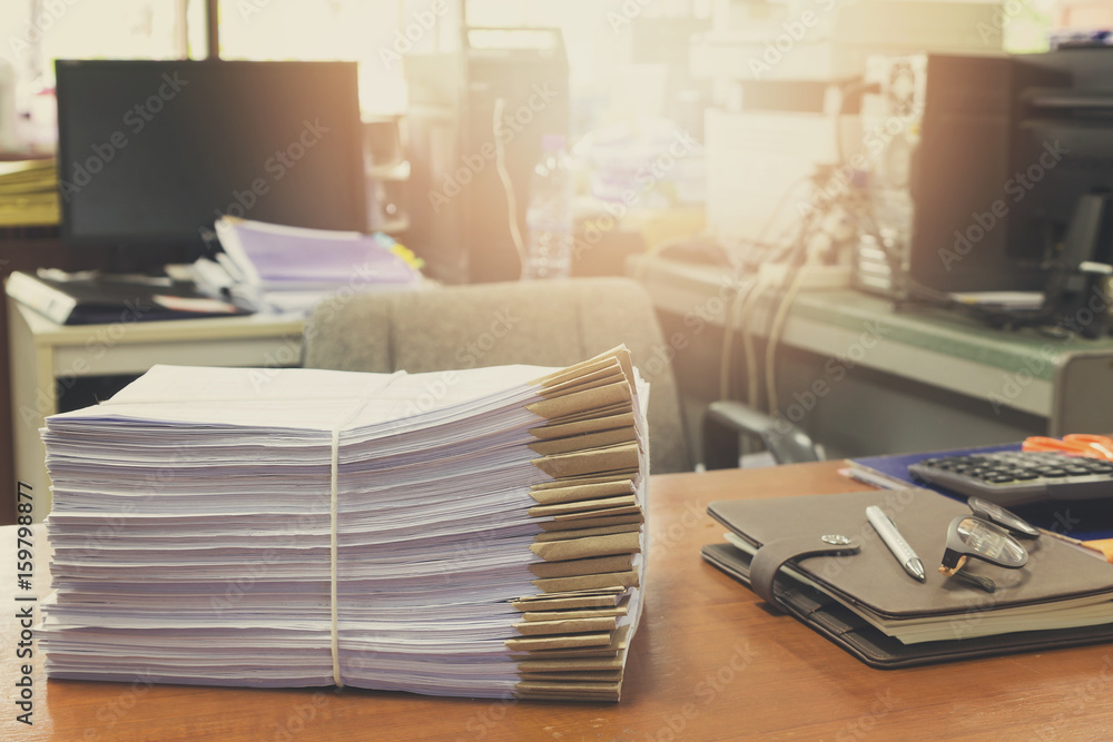 Pile of unfinished documents on office desk, Stack of business paper, Vintage Effect Pile of unfinished documents on office desk, Stack of business paper, Vintage Effect