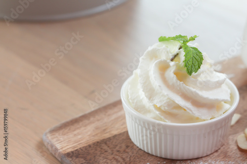 Obraz na plátne Whipped cream in ceramic cup