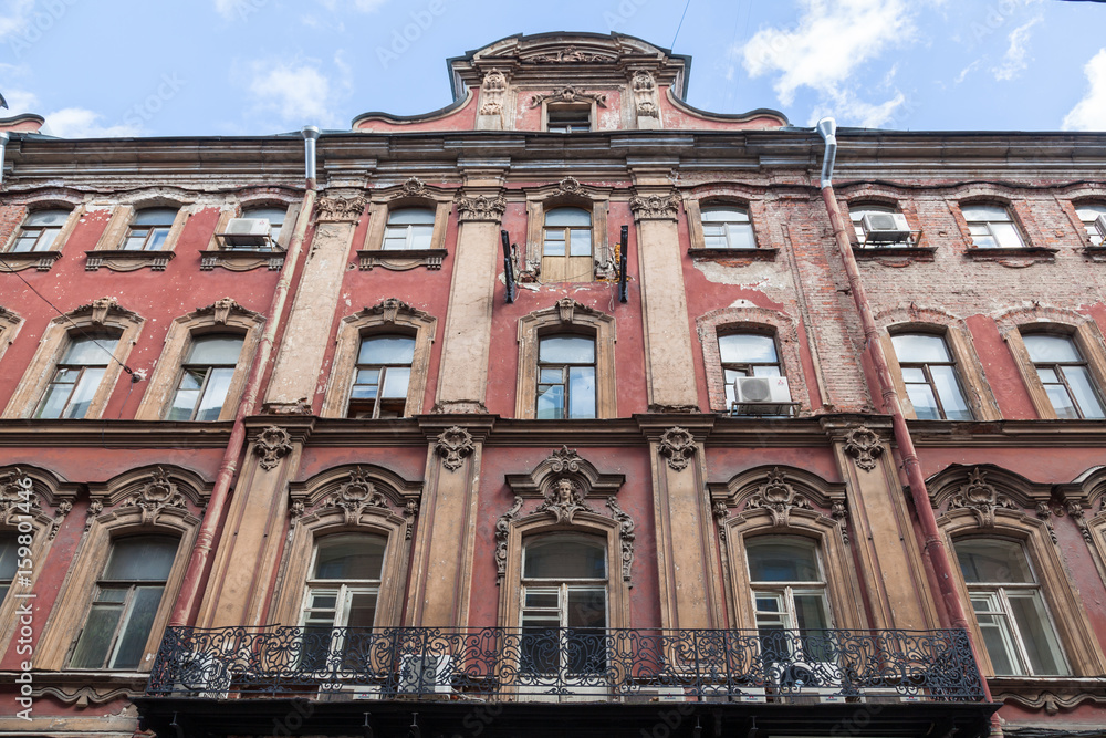 Part of the facade of house number 4 before the revolution - the Banking House of Gunzburg, in the Soviet years - LenzhilNIIproekt in the lane Zamyatin, St. Petersburg