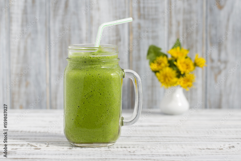Smoothies from dill, celery and banana, close up Smoothies from dill, celery and banana, close up