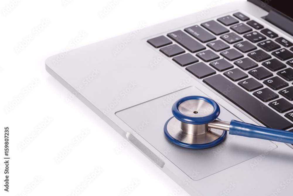Computer notebook or laptop and stethoscope. Checking virus or damaged check up concept. Computer notebook or laptop and stethoscope. Checking virus or damaged check up concept.